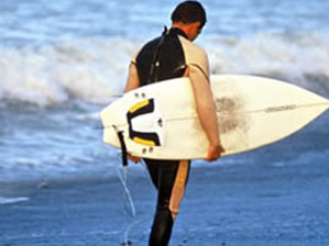 Image of Surfer at a beach. 